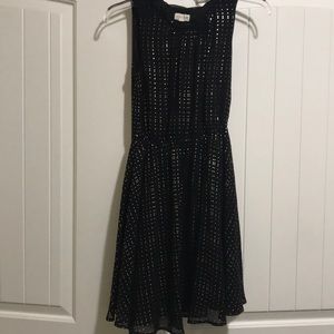 Black and gold polka dot dress